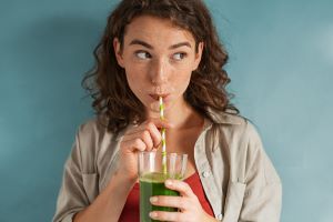 Photo: Girl with green drink
