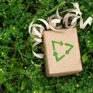Photo: Gift wrapped in brown paper with a recycle symbol