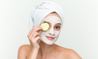 Photo: Woman with a facial mask