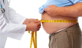 Photo: Overweight Man with a Burger and Soda