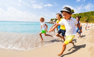 Photo: Kids running on the beach