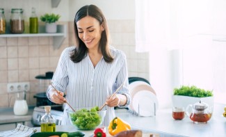 Photo: Woman Eating a Salad