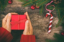 Photo: Hands Holding a Christmas Gift