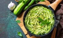 Photo: Delicious healthy zucchini topped with green leaves in a heart