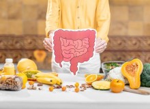 Photo: Bowel model and variety of healthy fresh food