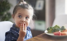 Photo: Girl Eating Yogurt