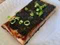 Photo: Sauteed tofu cutlet with nori sheet and green onions on top
